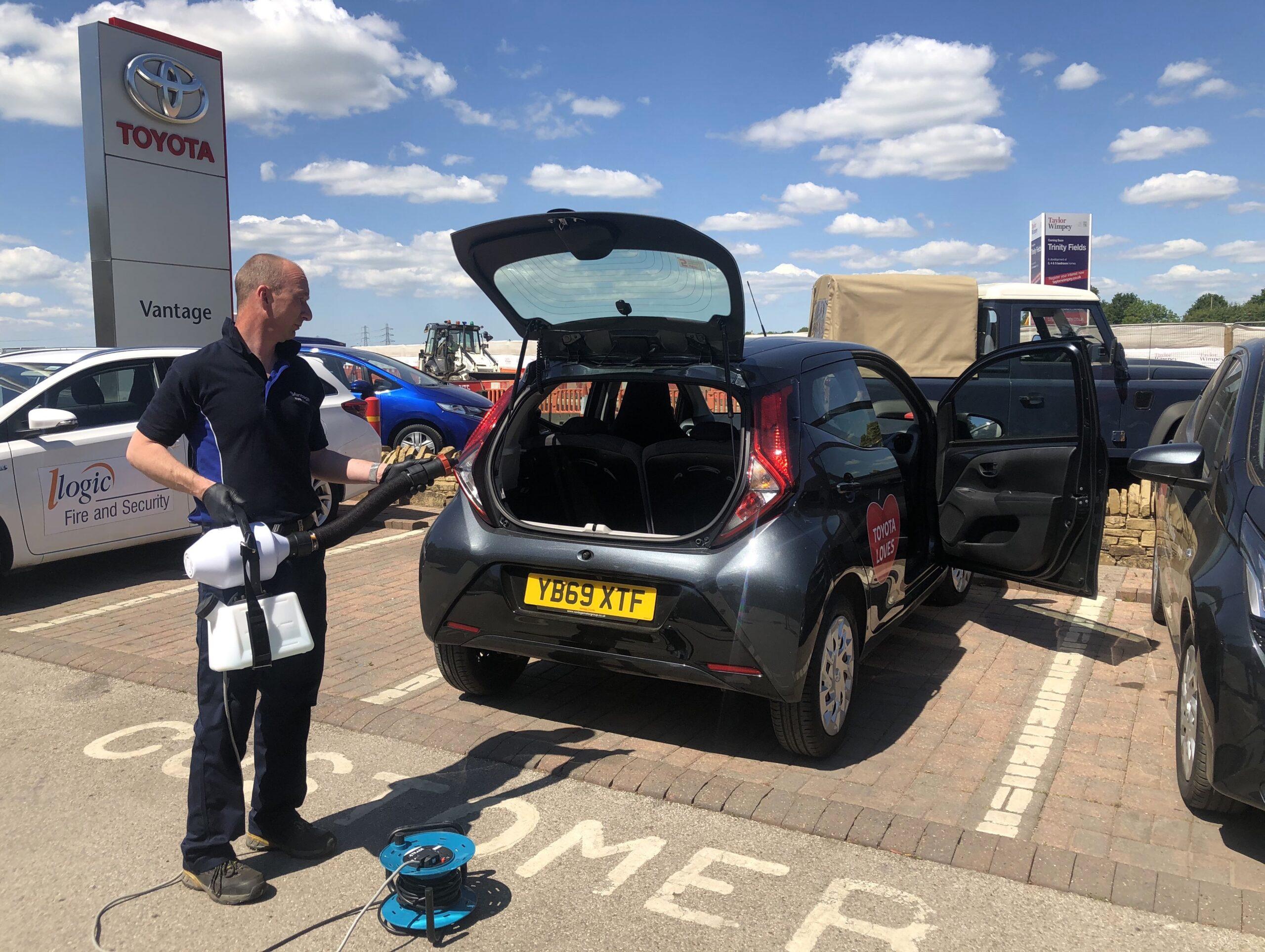 toyota-man-cleaning-car